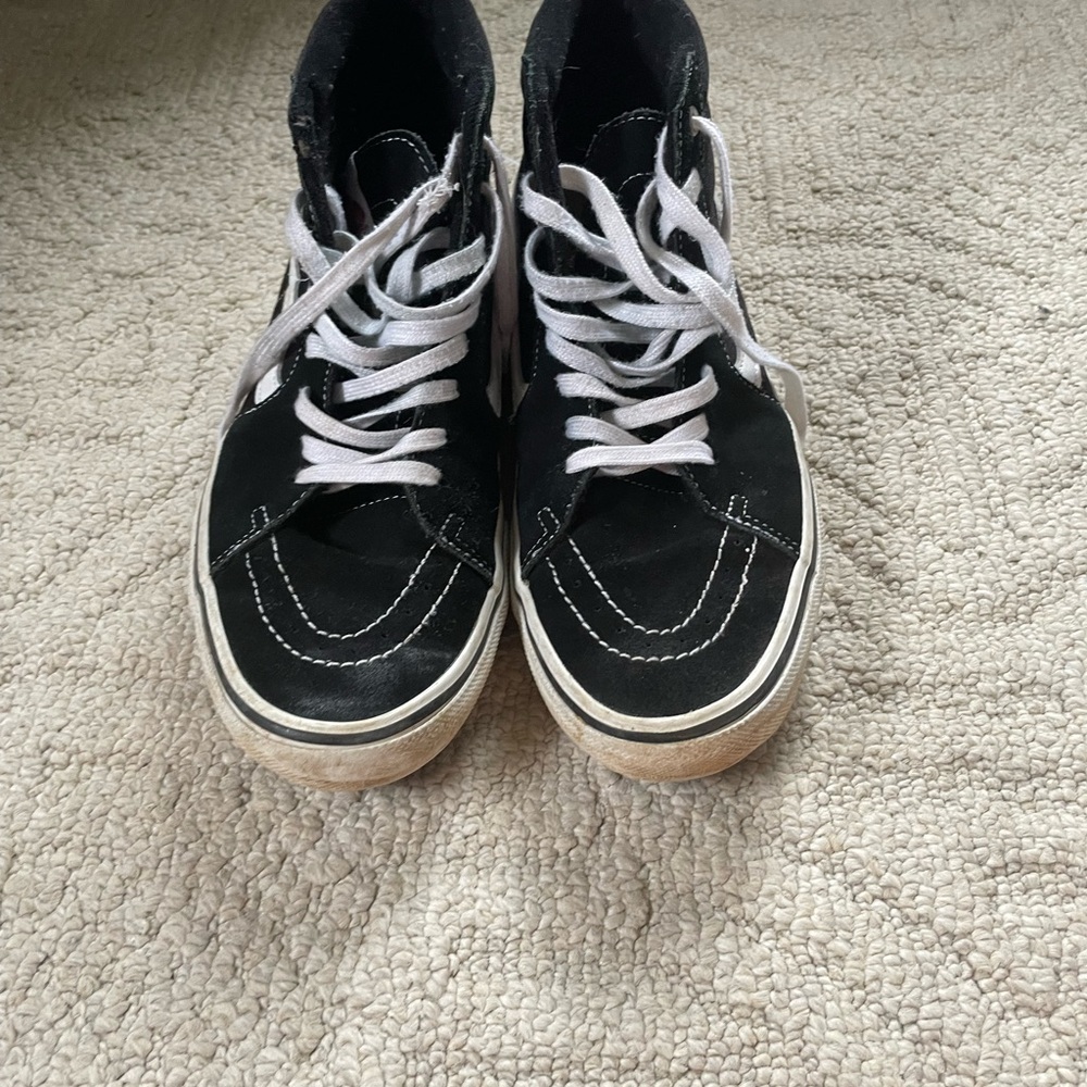 Vans Black and White High-Top Skate Shoe with Red Accents